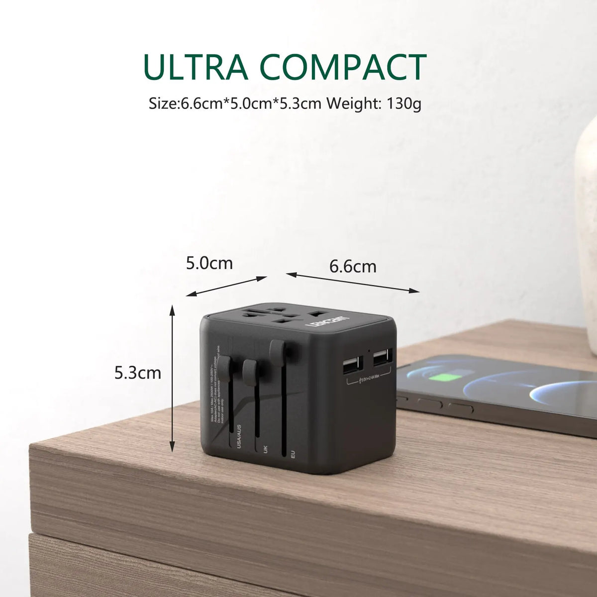 Universal Travel Adapter with Dual USB Ports - All-in-One Charger for EU, UK, USA, and AUS Plug Compatibility